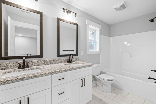 full bathroom featuring vanity, toilet, tile patterned flooring, and shower / bathing tub combination