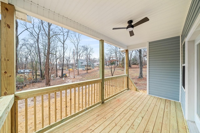 wooden deck with ceiling fan