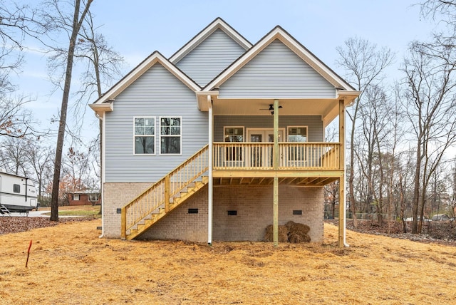 back of house with ceiling fan