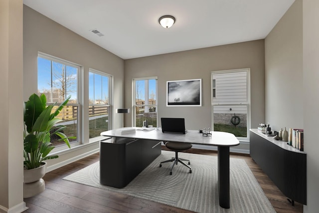 home office featuring dark hardwood / wood-style floors