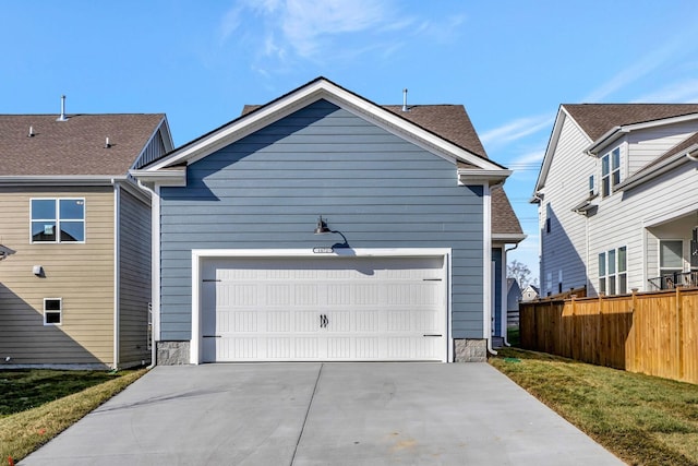 exterior space with a yard and a garage