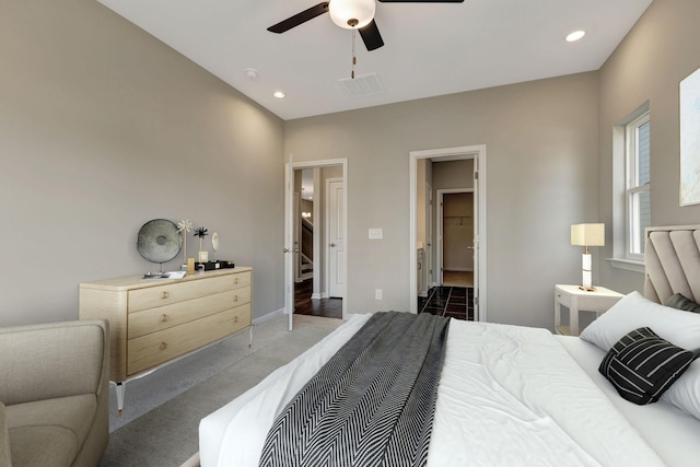 carpeted bedroom featuring ceiling fan