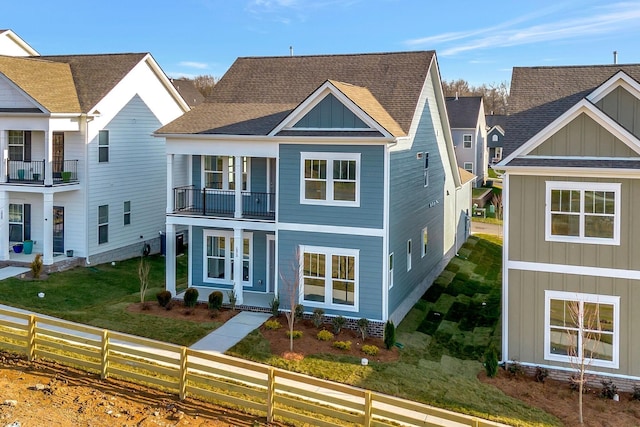 view of front of home with a balcony