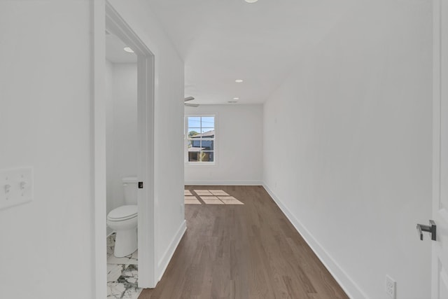 hallway featuring hardwood / wood-style floors