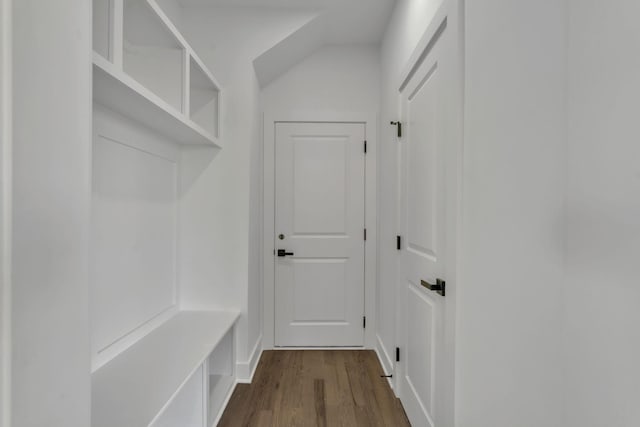 mudroom featuring hardwood / wood-style flooring and vaulted ceiling