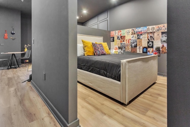 bedroom with light wood-type flooring