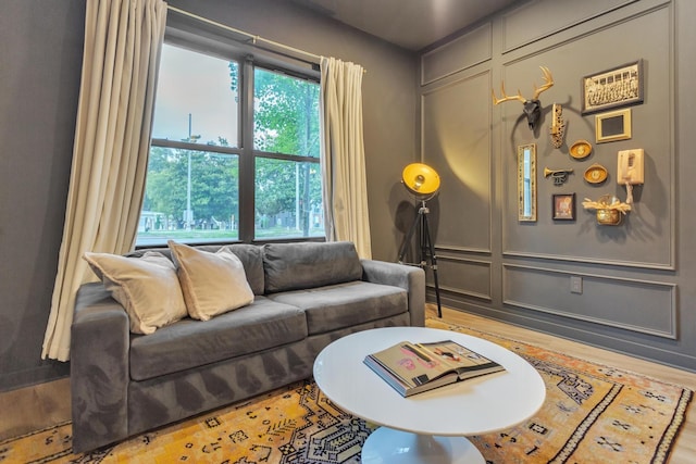 living room with wood-type flooring