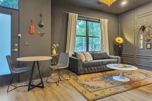 sitting room featuring light hardwood / wood-style floors