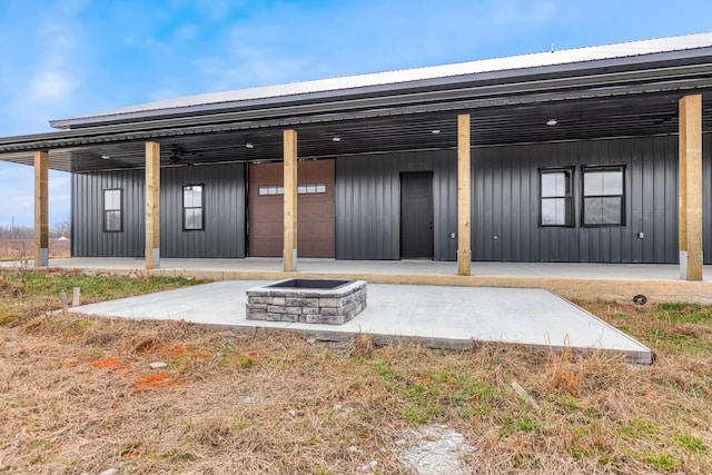 exterior space with a fire pit