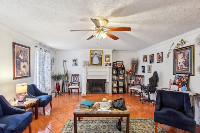 living room with tile patterned flooring, crown molding, and ceiling fan