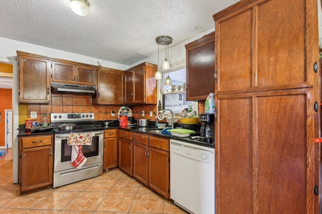 kitchen with stainless steel electric range oven, dishwasher, sink, decorative backsplash, and hanging light fixtures