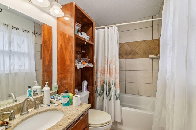 full bathroom with vanity, toilet, a textured ceiling, and shower / bath combo with shower curtain