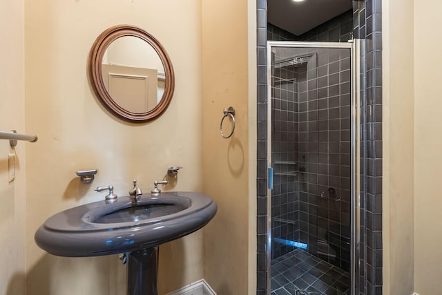 bathroom with an enclosed shower