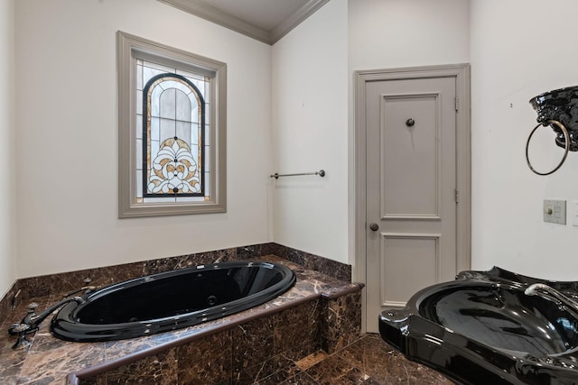 bathroom featuring tiled tub and ornamental molding