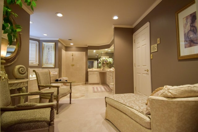 sitting room featuring crown molding and light carpet