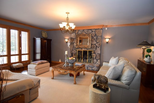 living room with ornamental molding, a fireplace, and a chandelier