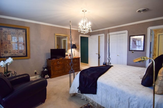 carpeted bedroom featuring multiple closets, ornamental molding, and a chandelier