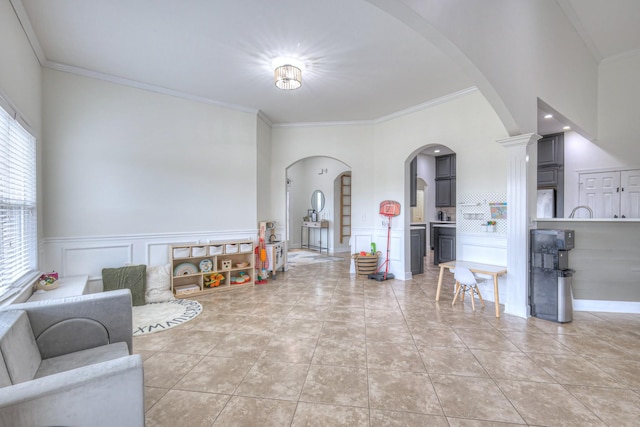 living room featuring crown molding and tile patterned floors