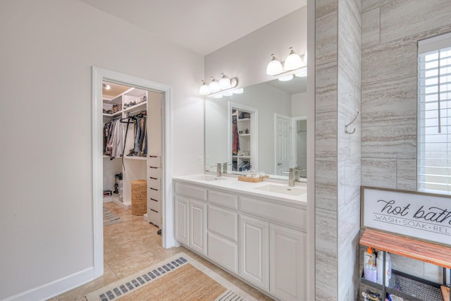 bathroom with vanity and tile patterned flooring