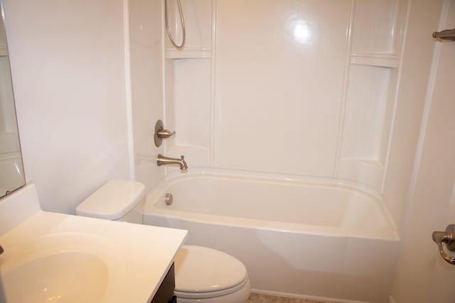 full bathroom with vanity, tub / shower combination, and toilet