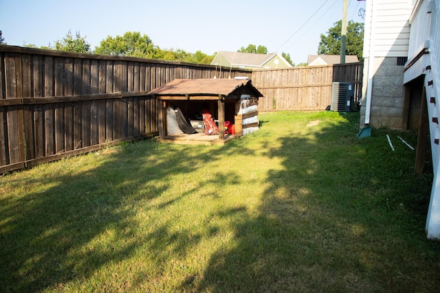 view of yard with central AC unit