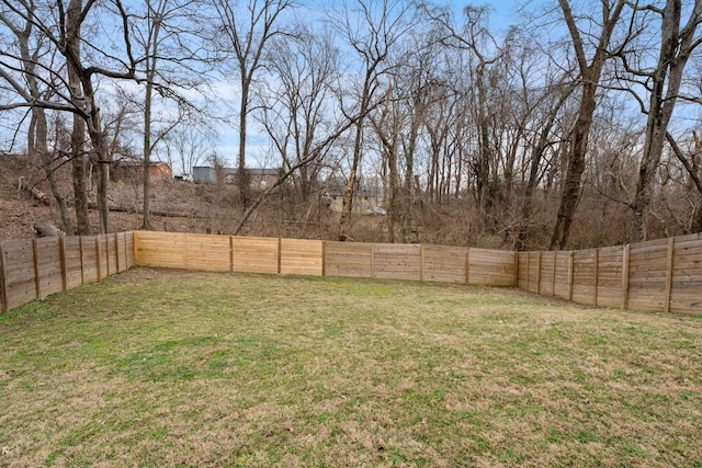 view of yard featuring a fenced backyard