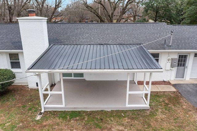 back of house featuring a patio area