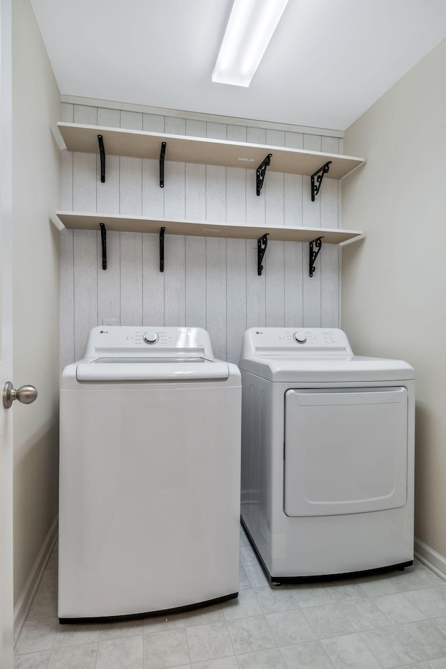 laundry area featuring washing machine and dryer