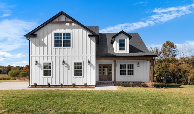 modern farmhouse with a front yard