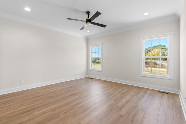 unfurnished room with ornamental molding, ceiling fan, and light hardwood / wood-style flooring