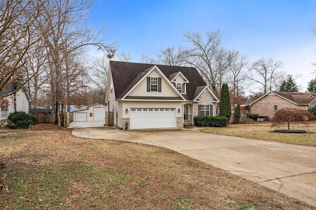 view of front facade with a garage and a front lawn