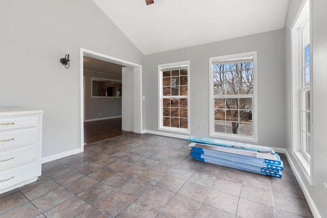 unfurnished sunroom with vaulted ceiling