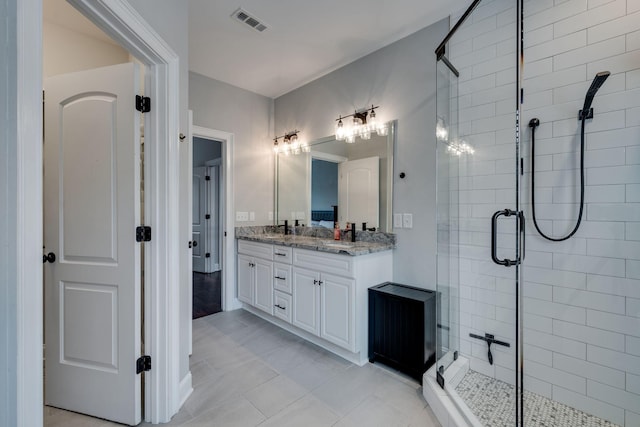 bathroom featuring vanity and walk in shower