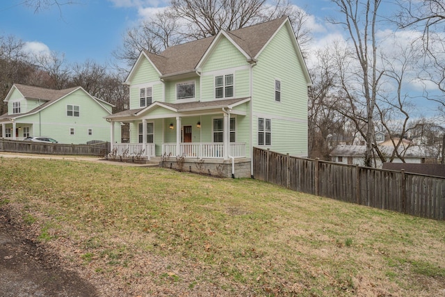 view of front of property featuring a porch and a front yard