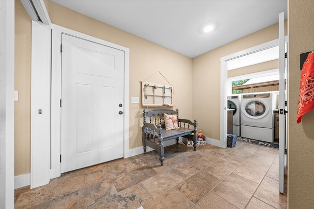 foyer with washing machine and dryer