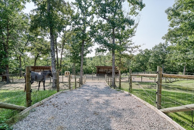 exterior space with an outbuilding and a rural view