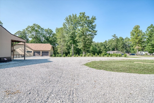 view of yard with a garage