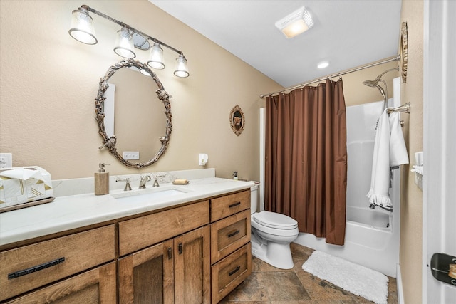 full bathroom featuring shower / bathtub combination with curtain, vanity, and toilet