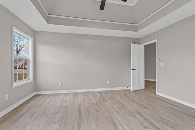 unfurnished room with ceiling fan and light wood-type flooring