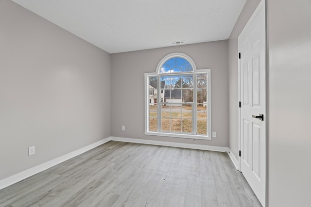 empty room featuring light hardwood / wood-style flooring