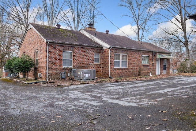 view of home's exterior featuring central air condition unit