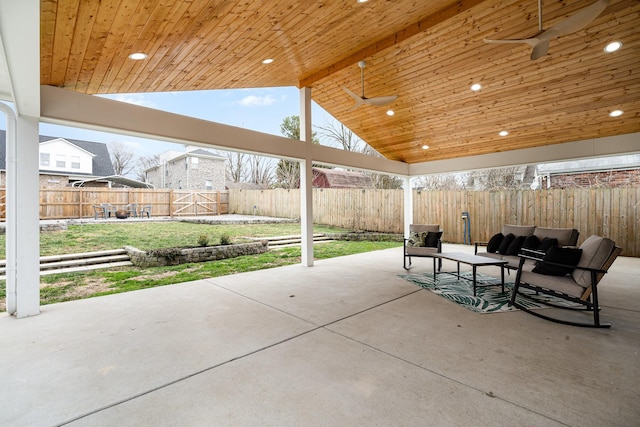 view of patio featuring ceiling fan and outdoor lounge area