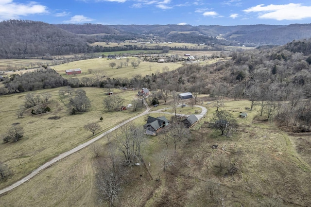 drone / aerial view with a mountain view and a rural view