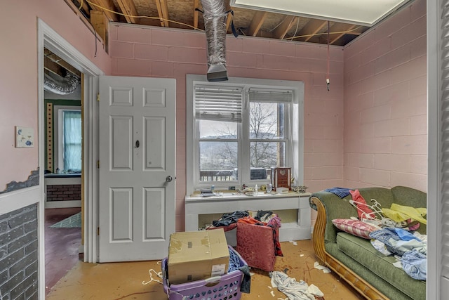 bedroom with concrete floors