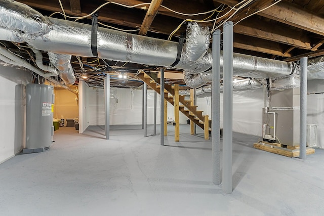 basement with heating unit and water heater