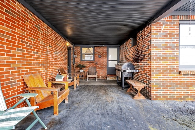 view of patio with a grill