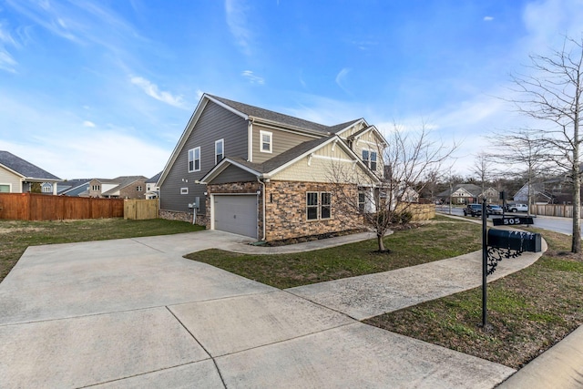 view of front facade with a garage and a front lawn