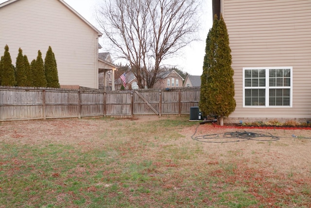 view of yard featuring central AC