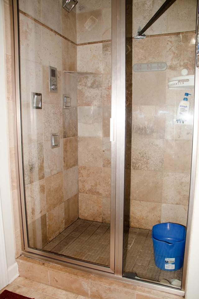 bathroom with an enclosed shower