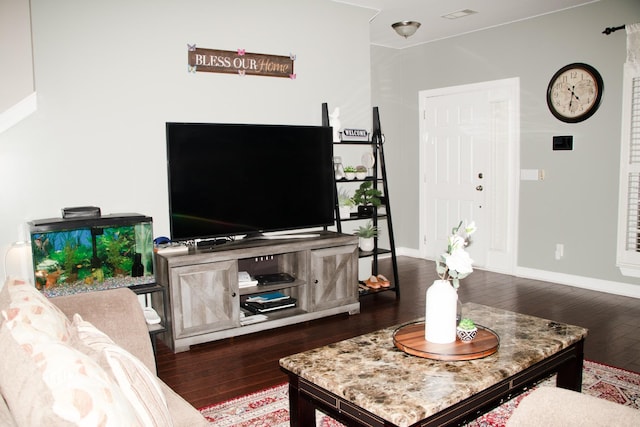 living room featuring dark hardwood / wood-style flooring